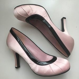 Pink satin heels with faux leather trim